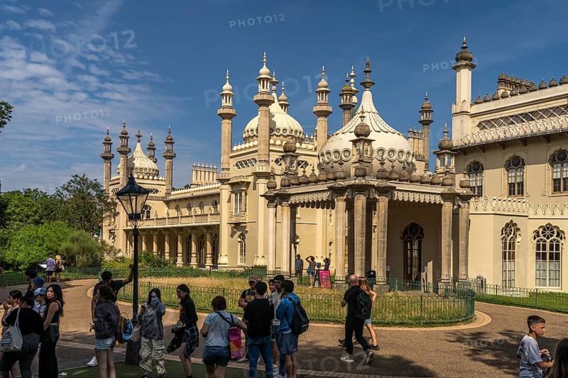 Students in front of the Royal Pavilion in the seaside resort of Brighton, England, Great Britain