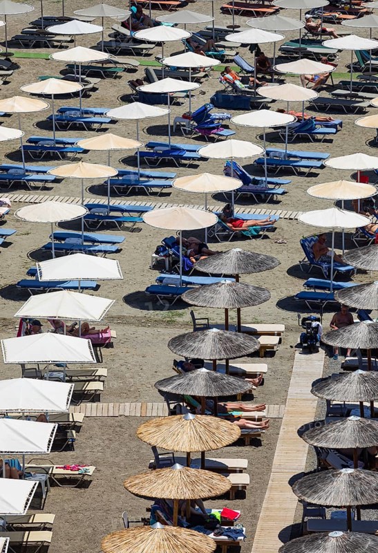 Parasols on Agia Galini beach, Agia Galini, south coast, Crete, Greece, Europe