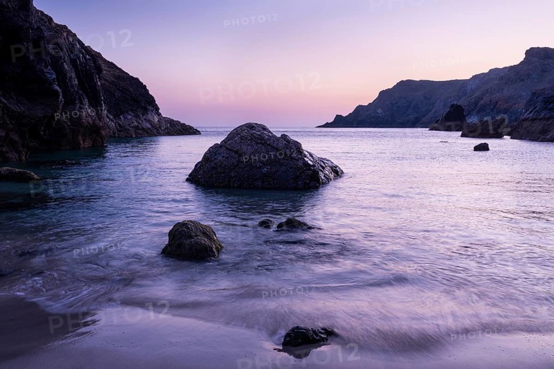 Coast and rocks in Kynance Cove. Evening, blue hour. Kynance Cove, Lizard Peninsula, Cornwall, England, Great Britain