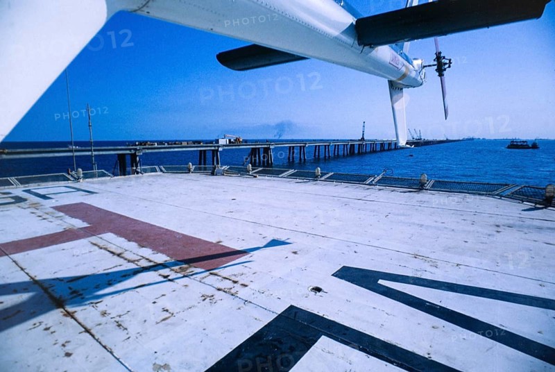 Oil industry in Ras Tanura area, Saudi Arabia, helicopter pad on offshore pier 1979, Asia