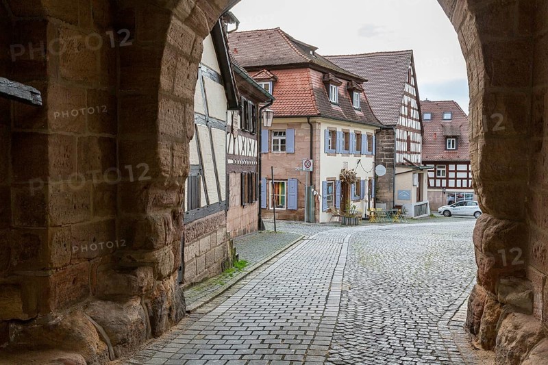 View through the town gate into the historic old town of Cadolzburg, Bavaria, Germany, Europe