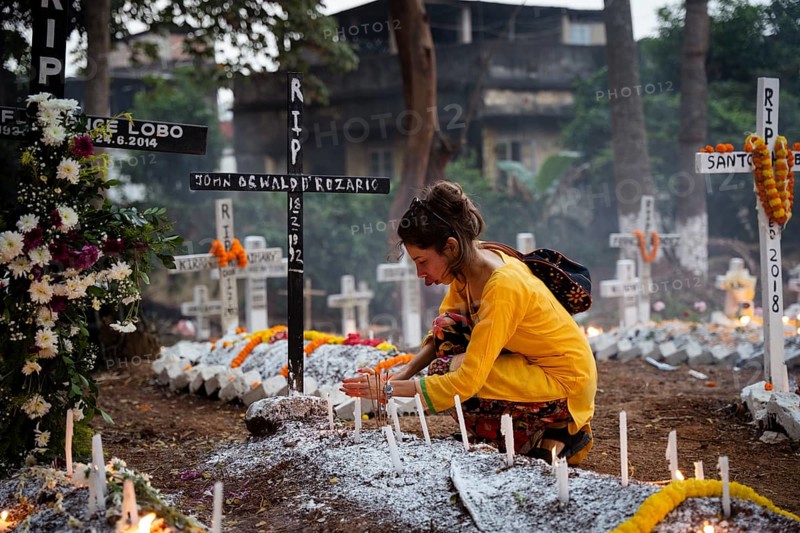 People from Christian community light candles and offer prayers on the grave of their relative during the All souls day observation, in Guwahati, India on 2 November 2024. All Souls' Day is a Christian holiday dedicated to honoring and praying for the souls of the departed