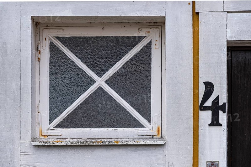 The number 4 on a front door next to a window, Karlskrona, Blekinge län, Sweden, Europe