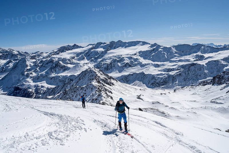 Mountain panorama with snow-covered mountain landscape, ski tourers climbing to the Madritschspitze, Ortler Alps, Vinschgau Valley, Italy, Europe