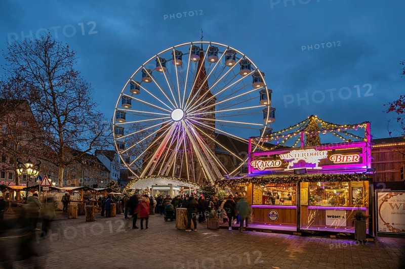 The winter village with Ferris wheel, Christmas market at dusk, Jakobsplatz, Nuremberg, Middle Franconia, Bavaria, Germany, Europe