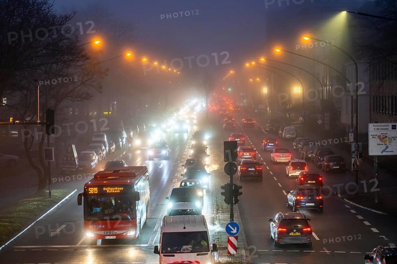 Dense fog, with visibility sometimes less than 100 metres, city centre traffic at rush hour on Alfredstraße, B224, in Essen, North Rhine-Westphalia, Germany, Europe