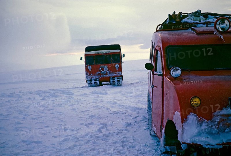 Mercedes Benz snow chain vehicle and GUSI Bombardier B 12 snowmobile, Gudmundur Jonasson travel company adventure Arctic expedition to the frozen ice cap, Iceland, 1972, Europe