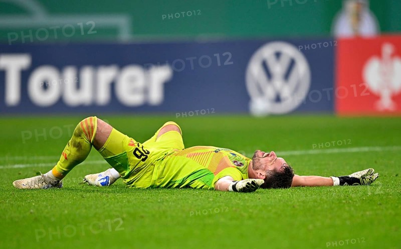 Goalkeeper Christian Mathenia 1. FC Nürnberg FCN (24) lies disappointed on the groundDFB-Pokal, PreZero Arena, Sinsheim, Baden-Württemberg, Germany, Europe