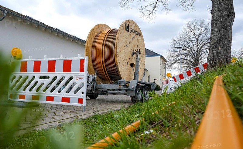 Rheinbach, North Rhine-Westphalia, Germany - Internet broadband expansion, construction site for laying fibre optic cable, cable drum with fibre optic cable, new construction of fibre optic routes on behalf of Telekom, fast Internet, DSL cable connection for households