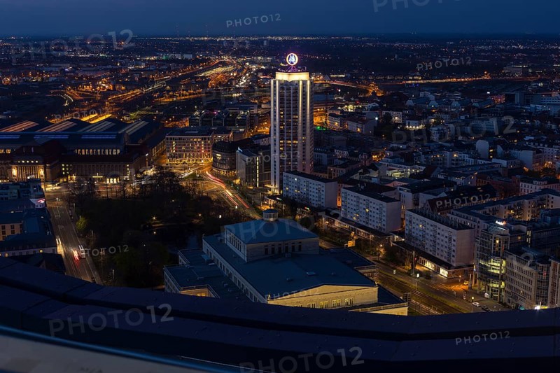 View of the city at night from the city tower block looking north with the main railway station and the Wiga winter garden tower block, Leipzig, Saxony, Germany, Europe