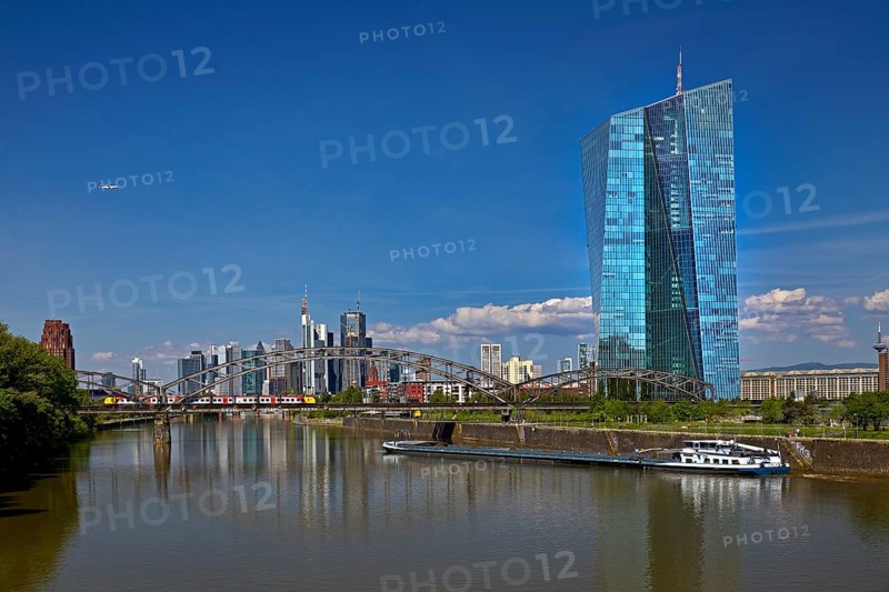 ECB European Central Bank with cargo ship on the river Main and the skyline of Frankfurt am Main, Hesse, Germany, Europe