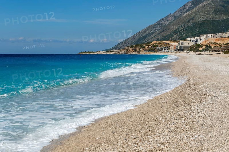 Ionian Sea, Drymades beach, Albanian Riviera, Dhermi, Albania large scale tourist development construction building work in distance