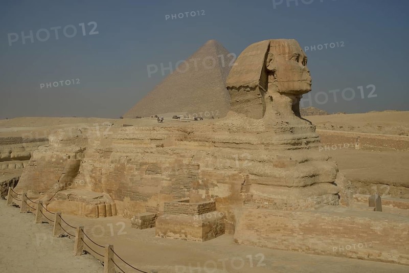 Sphinx or Great Sphinx of Giza, lion with a human head, built in the 4th Egyptian dynasty around 2700 BC, in front of the Pyramid of Cheops, Giza, Egypt, Africa