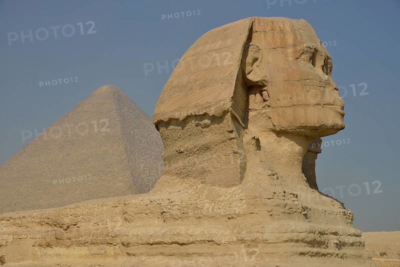 Sphinx or Great Sphinx of Giza, lion with a human head, built in the 4th Egyptian dynasty around 2700 BC, in front of the Pyramid of Cheops, Giza, Egypt, Africa