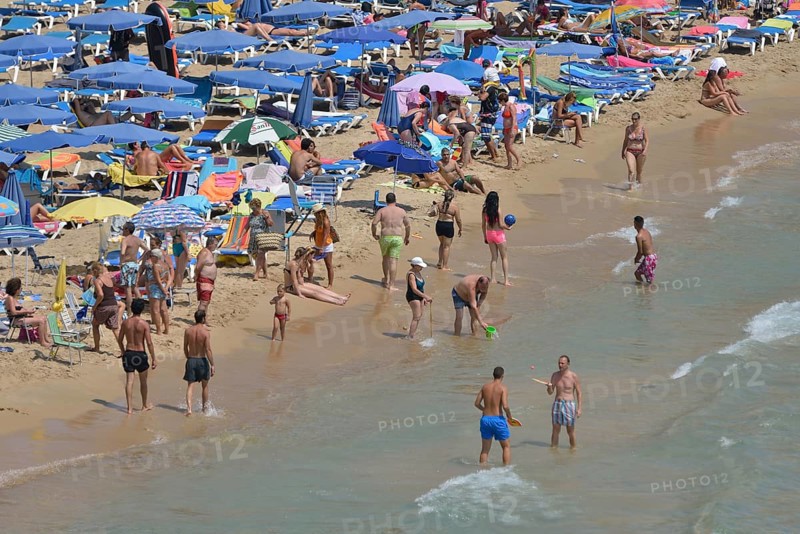 Bathers on Playa Levante, Benidorm, Costa Blanca, Spain beach