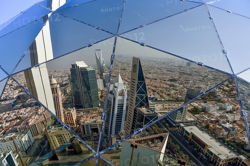 Reflection of the skyline in the glass sphere of Al Faisaliah Tower, Riyadh, Saudi Arabia, Asia