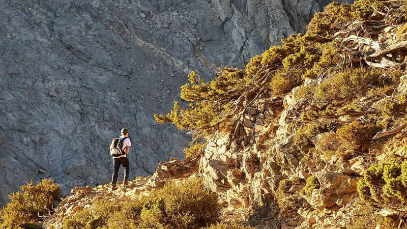 Hikers on hiking trail, Gingilos, Hiking on the Gingilos, Morning light, Samaria Gorge, Omalos, Lefka Ori, White Mountains, West Crete, Island of Crete, Greece, Europe