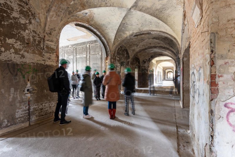 Group of visitors in the Alpenhaus, Beelitz-Heilstätten, former lung sanatorium, military hospital of the Soviet army from 1945 to 1994, today a lost place, Beelitz, Brandenburg, Germany, Europe