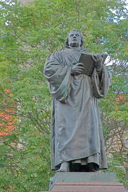 Sculpture Martin Luther monument, Luther monument, Bible, arm, hold, book, Anger, Erfurt, Thuringia, Germany, Europe