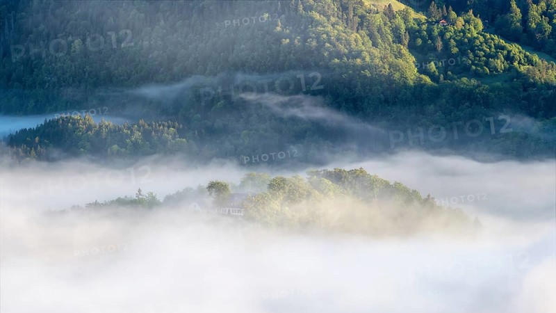 Morning fog over the village of Berchtesgaden in the valley, Berchtesgaden National Park, Upper Bavaria, Germany, Europe