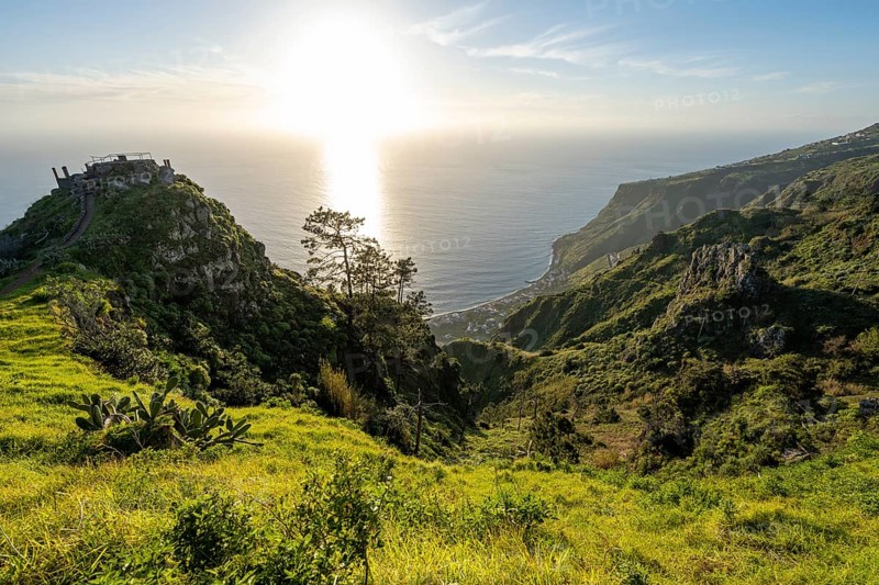Evening mood, green coastal landscape on a steep cliff, sea and coast, viewpoint Miradouro da Raposeira, Paul do Mar, Madeira, Portugal, Europe