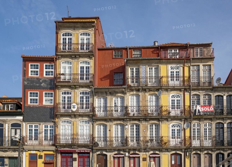 Colorful facades of houses along Cais da Estiva in the Ribeira district, Porto, Portugal, Europe