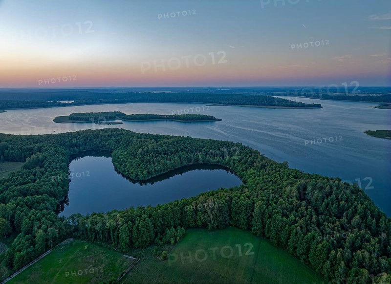 Aerial view of Lake Wigry and the landscape in the Wigry National Park in northern Poland in the evening light. Krusznik, Podlaskie, Poland, Europe