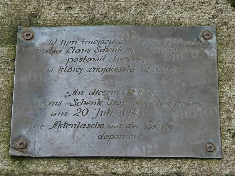 Memorial plaque for the Hitler assassin Claus Schenk Graf von Stauffenberg at the Wolf's Lair (also Wolfschanze or Görlitz), the military situation centre of the command staff of the German Wehrmacht. The Wolf's Lair is now a museum. Gierloz, Ketrzyn, Warmia-Masuria, Poland, Europe