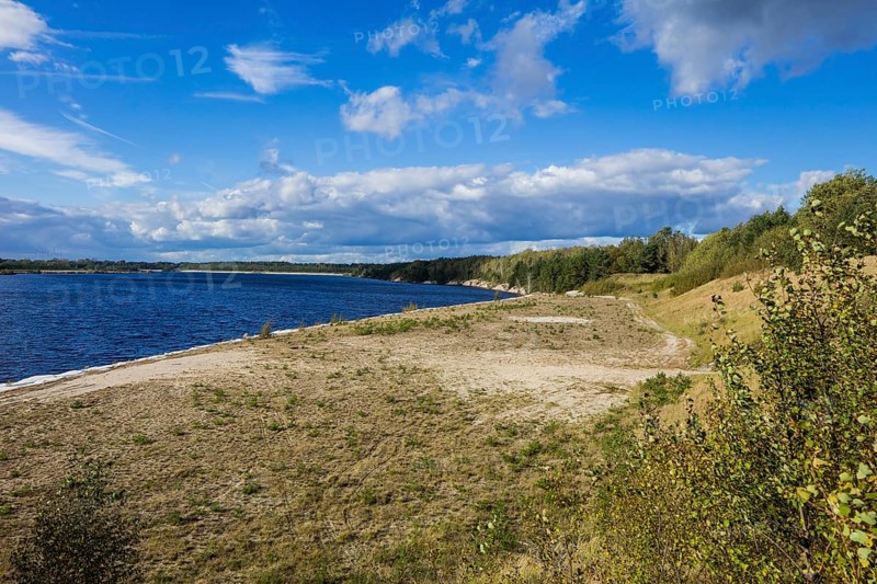 The Sabrodt Lake, in Upper Sorbian Zabrodski jezor, is a flooded lake in the residual hole of the former open-cast mine Spreetal-Nordrandschlauch . It is located north of Hoyerswerda and south of the village of Sabrodt near the Brandenburg border in Lusatia in Saxony. It is a part of the emerging Lusatian Lakeland