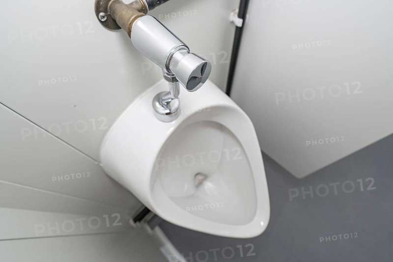 Close-up of a white urinal in a modern style, refugee accommodation Beermiß, Calmbach, Black Forest, Germany, Europe