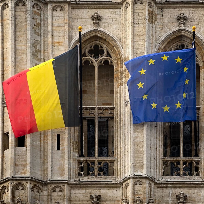 Belgian national flag and European flag in front of the baroque façade of the town hall, Hôtel de Ville, Grand-Place, Grote Markt, Brussels, Belgium, Europe