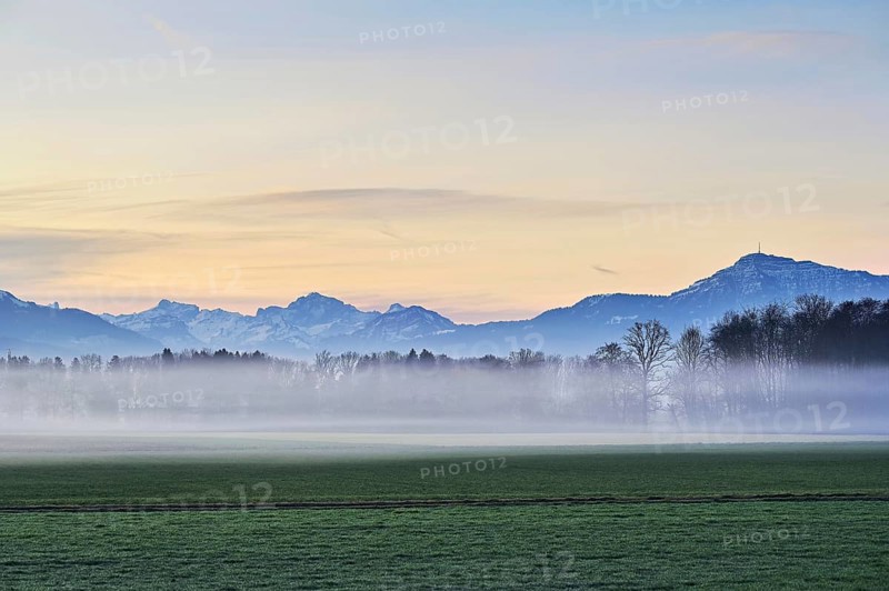 Early morning fog in the Reuss valley, snow-covered Rigi in the background, Merenschwand, Freiamt, Canton Aargau, Switzerland, Europe