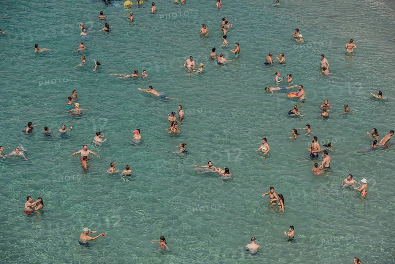 Tourists at the Playa Mal Pas, Benidorm, Province of Alicante, Costa Blanca, Spain, Europe