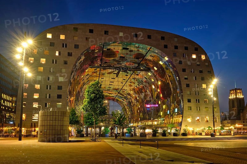 ROTTERDAM, NETHERLANDS, MAY 25, 2018: Markthal Market Hall residential and office building with a market hall underneath in Rotterdam designed by by architectural firm MVRDV illuminated in night
