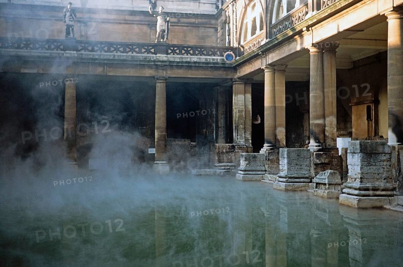 Steam rising from the hot waters of the Great Bath, Roman Baths, Bath, North East Somerset, England, UK 1977