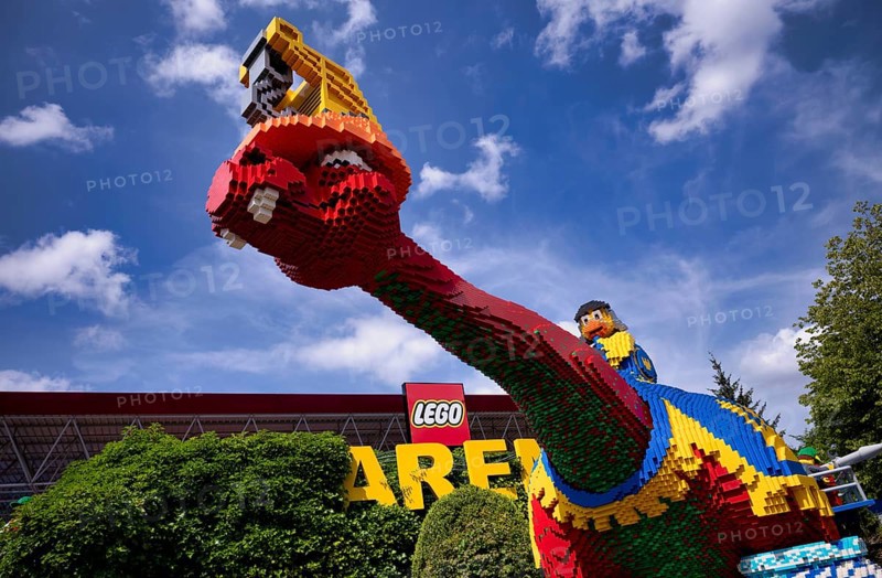 Dinosaurs in front of LEGO Arena, LEGOLAND theme park, Germany, Logo, Günzburg, Bavaria, Germany, Europe