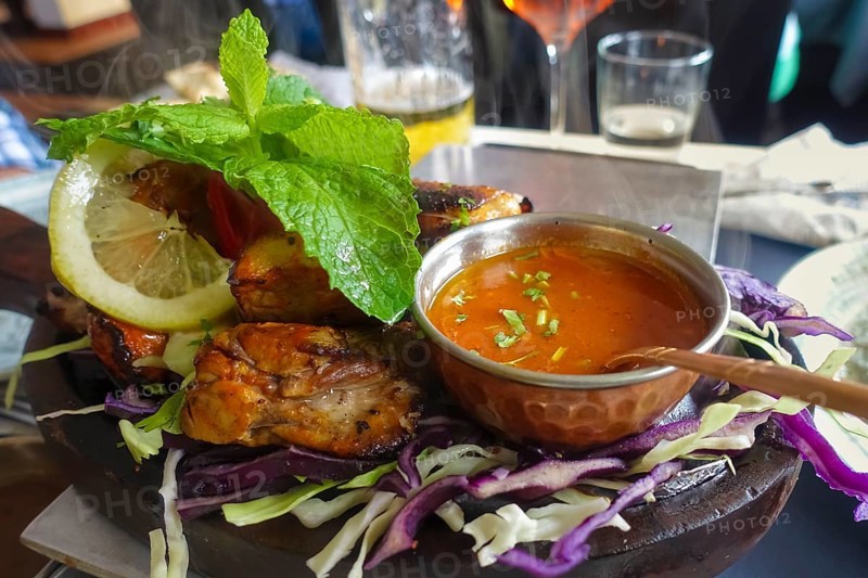 Indian cuisine, Indian duck with red cabbage, sauce, lemon slice, roasted, savoury, salty, traditional cuisine, food photography, studio, Germany, Europe