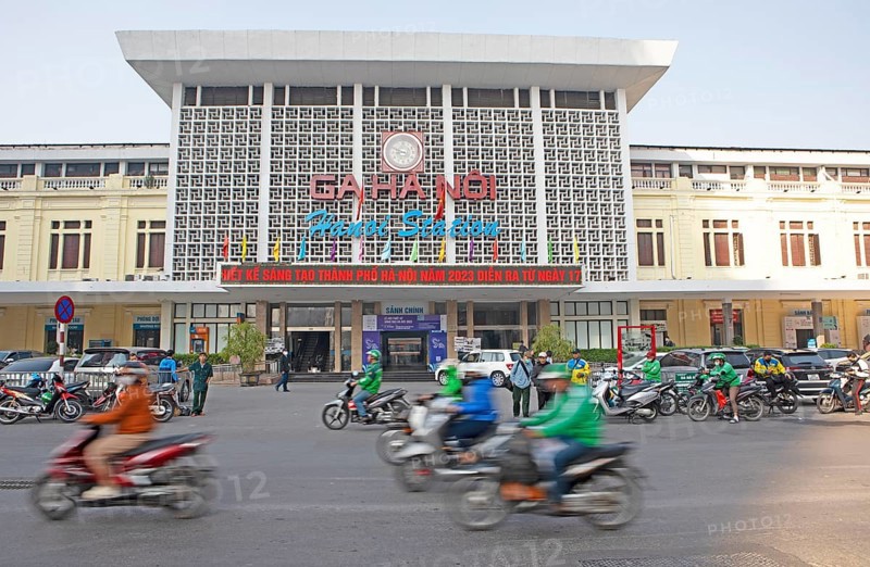 Moped rider at Hanoi railway station, Vietnam, Asia