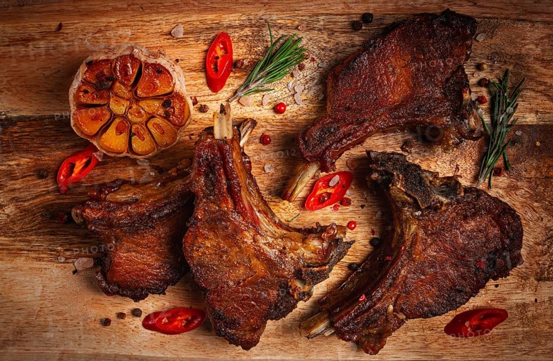 Fried veal ribs, with spices, baked in the oven, homemade, no people