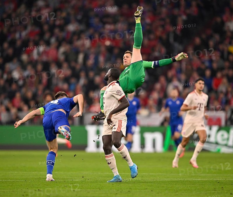 Goalkeeper Manuel Neuer FC Bayern Munich FCB (01) is injured in a duel with Bruno Petkovic GNK Dinamo Zagreb (09) and Dayot Upamecano FC Bayern Munich FCB (02) Champions League, Allianz Arena, Munich, Bavaria, Germany, Europe