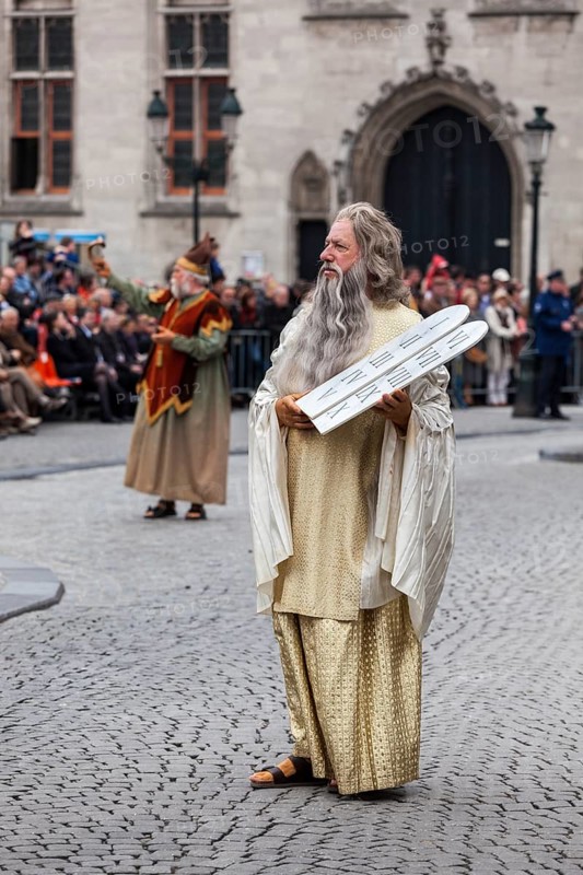 BRUGES, BELGIUM, MAY 17: Annual Procession of the Holy Blood on Ascension Day. Locals perform dramatizations of Biblical events, Moses with the Ten Commandments. May 17, 2012 in Bruges (Brugge), Belgium, Europe