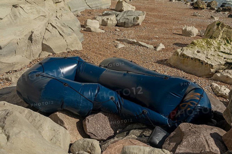 Damaged dinghy on the beach, Samphire Hoe country park, Kent, England, United Kingdom, Europe