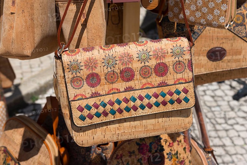 Close-up of a handbag with detailed pattern and bright colours, showing handicraft work at a market, cork bag, cork, Nazare, Nazaré, Oeste, Leiria district, Centro, Portugal, Europe