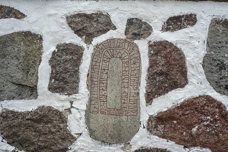 Rune stone embedded in a wall in Glemmingebro, Ystad Municipality, Skåne County, Sweden, Scandinavia, Europe