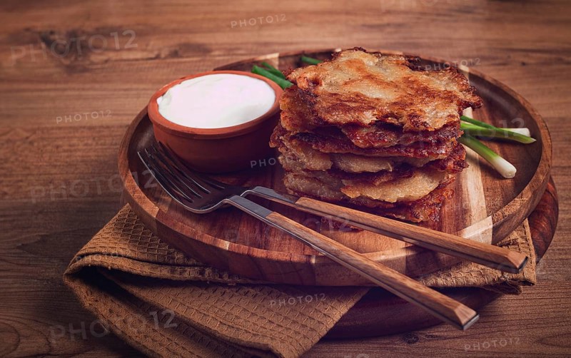 Potato pancakes, pancakes with sour cream, Belarusian dish, homemade, no people