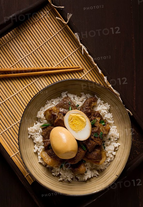 Stewed eggs, with pork belly, and rice, chinese food, homemade, selective focus, rustic, no people