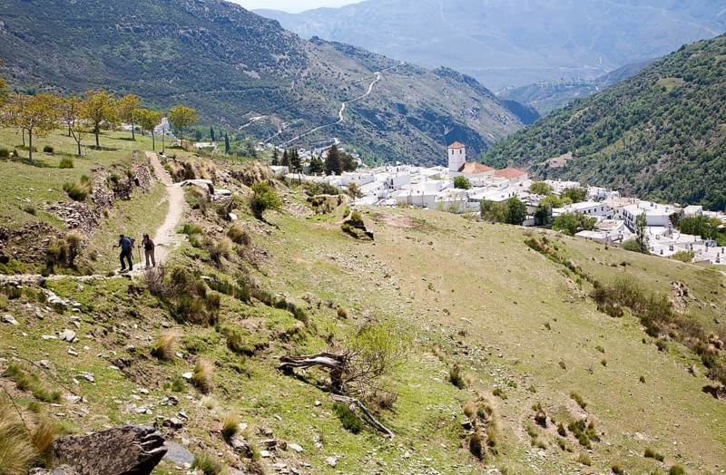 Walkers near the village of Capileira, High Alpujarras, Sierra Nevada, Granada province, Spain, Europe