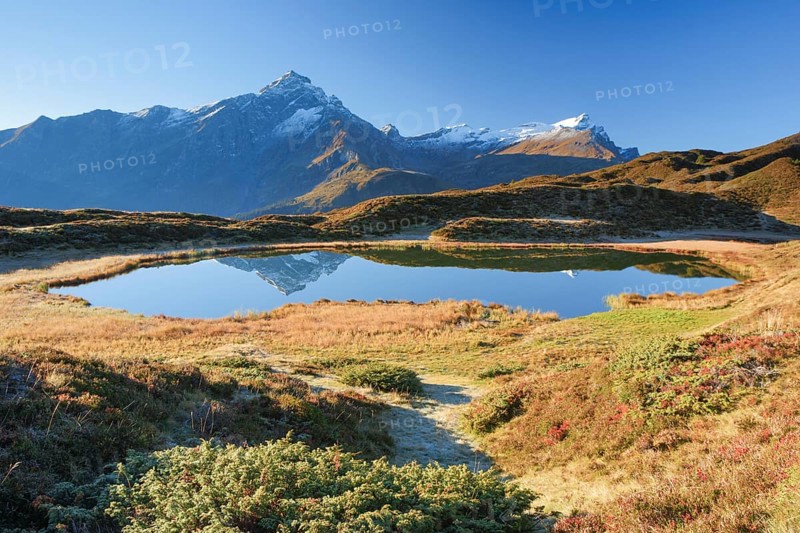 Piz Beverin and mountain lake, Grisons, Switzerland, Europe