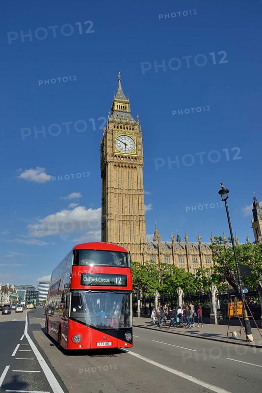 Red double-decker bus in front of the Big Ben, London, England, United Kingdom, Europe