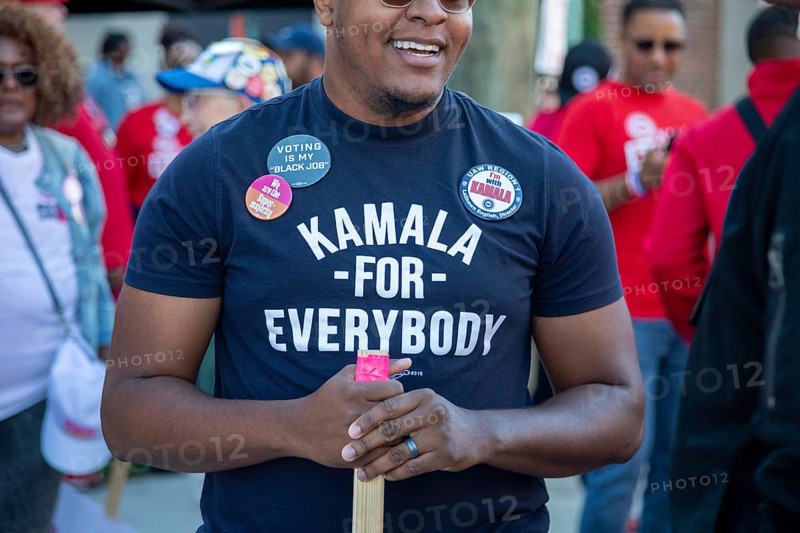 Detroit, Michigan USA, 2 September 2024, Union members participate in Detroit's Labor Day parade. An auto worker wears a Kamala Harris shirt